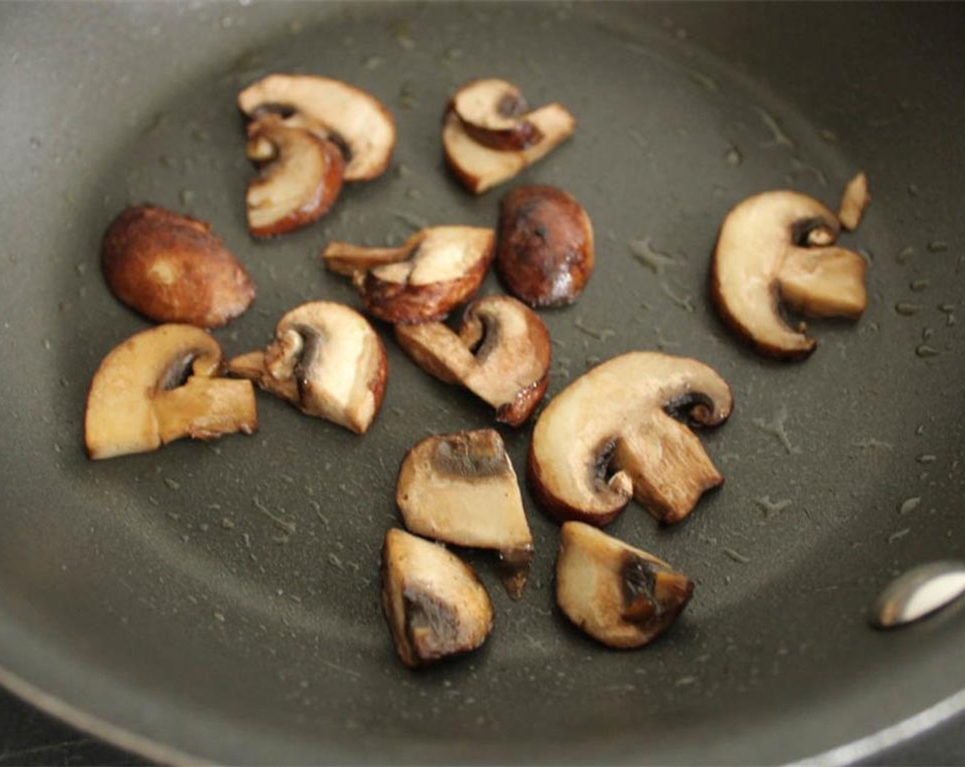 step 13 While your dough is baking, quickly sauté the Baby Bella Mushroom (1/3 cup) in Olive Oil (1 tsp) for 3-4 minutes until tender. Briefly set aside.