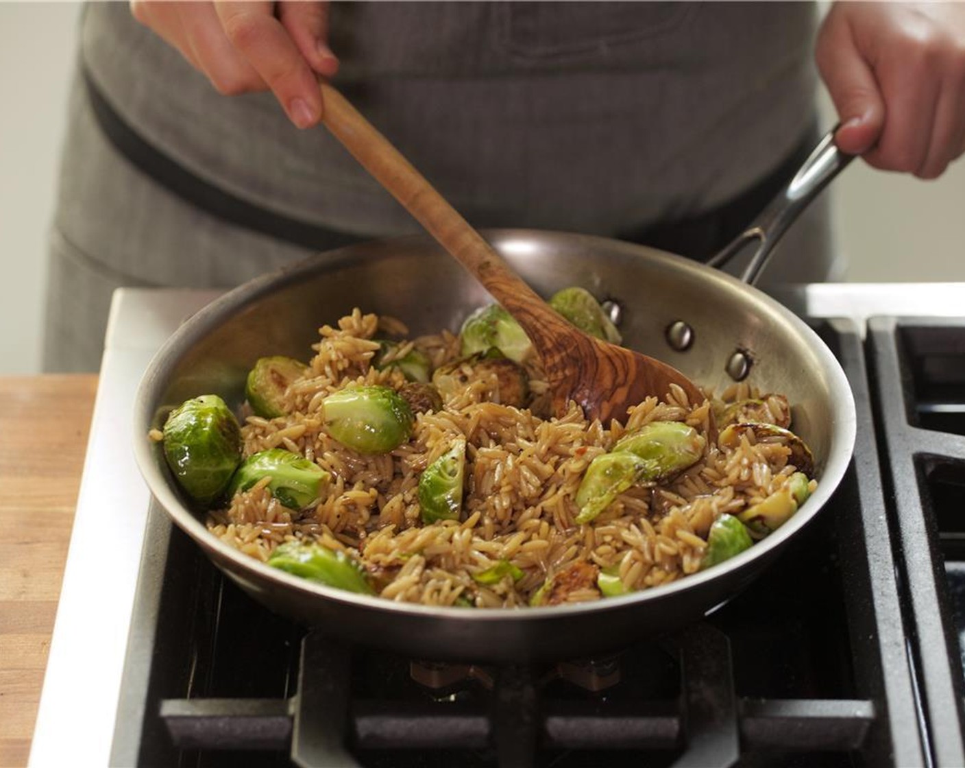 step 11 Remove from heat and add the brussels sprouts to the saucepan with the orzo. Stir to combine and keep warm.