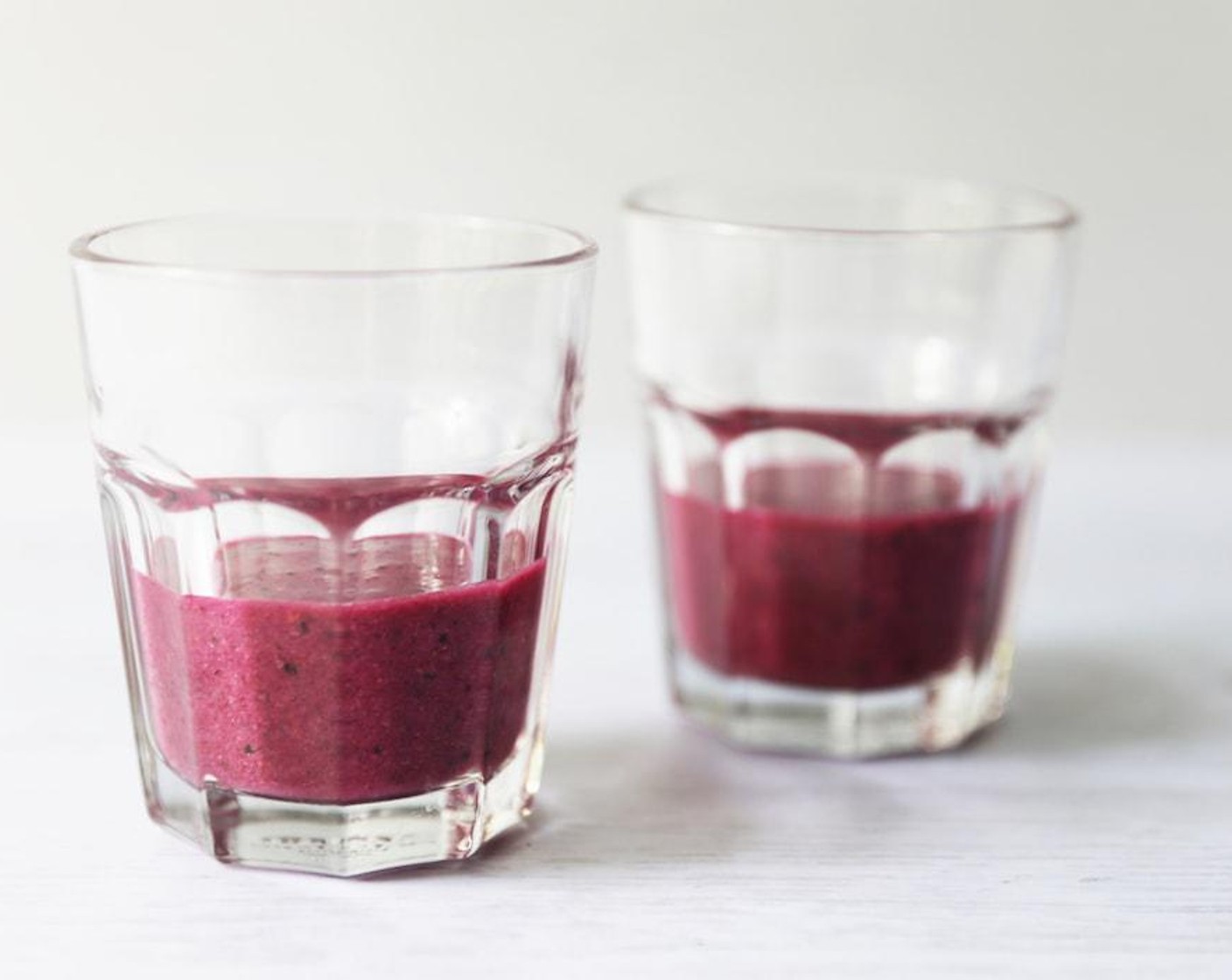 step 4 Divide berry and dragon fruit mixture between two glasses and top with chia pudding.