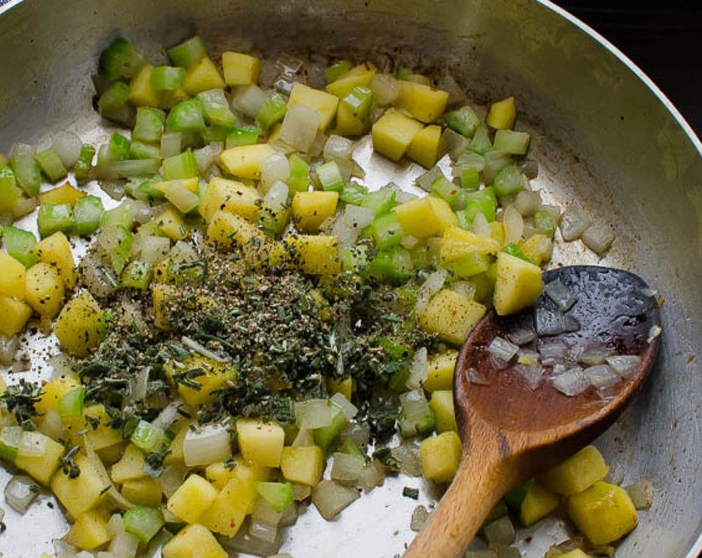 step 3 Add the Onion (1 cup), Celery (1 stalk), and Apple (1 cup) to the pan and cook, stirring occasionally, until the vegetables and apple become slightly translucent and tender.