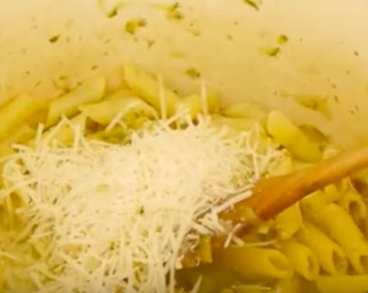 step 8 Once the pasta is aldente to your taste add a handful of Parmigiano-Reggiano (to taste). Remember to leave the pot with a little bit of water as it is this that will create the creaminess with the melted cheese.