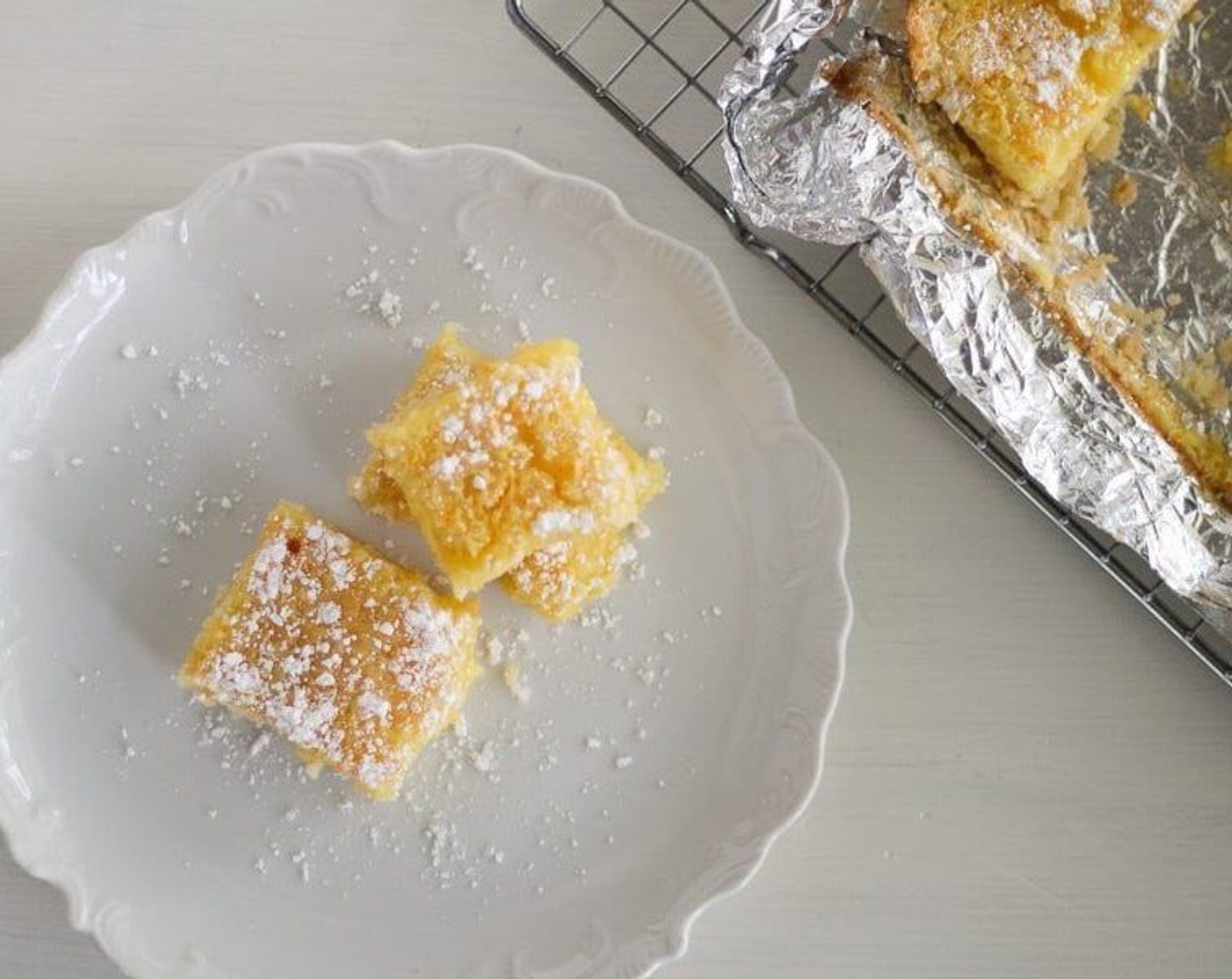 step 8 Remove from the oven and carefully lift the foil and transfer to a wire cooling rack. Let cool completely, sprinkle with powdered sugar if desired, cut and serve. Enjoy!