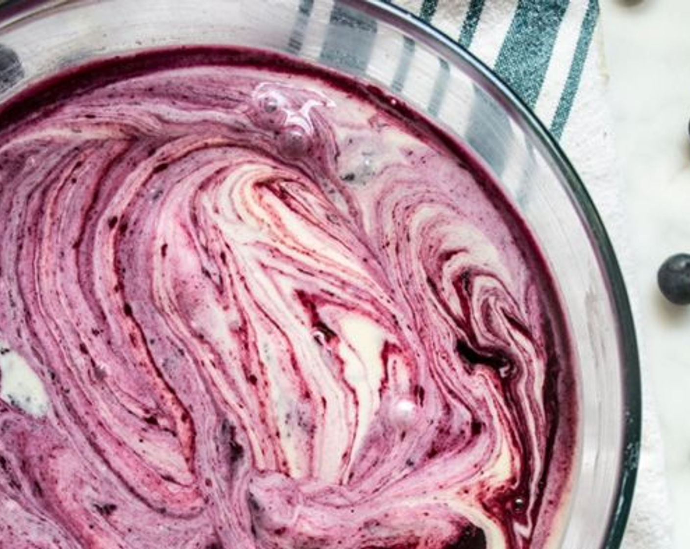 step 5 Use a butter knife to swirl blueberry compote into ice cream.