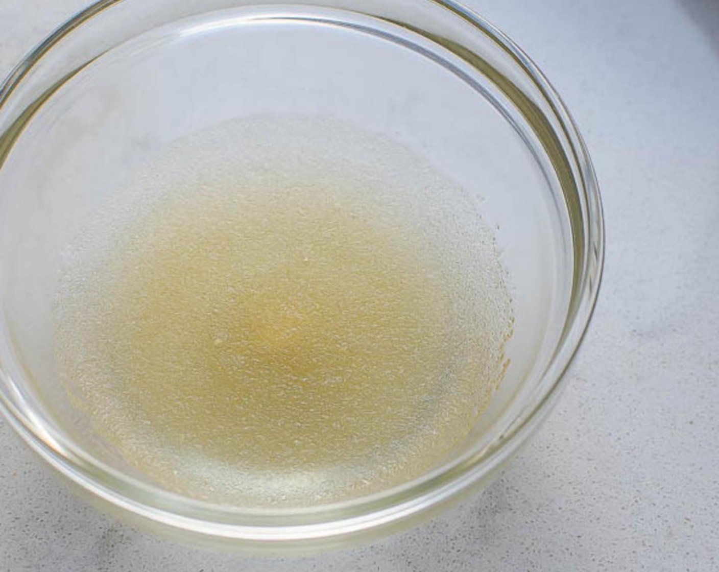 step 5 Place the Gelatin Powder (2 tsp) in a small bowl and cover with Water (2 Tbsp). Let stand two minutes to bloom. Microwave in 10-second bursts until gelatin is dissolved. Cool the gelatin to near room temperature, but do not let it set.