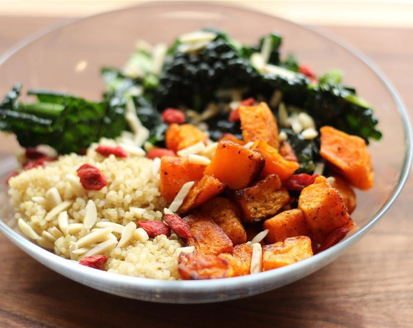 step 4 Layer the bowl from bottom up with Quinoa (1 cup), shredded kale, and Butternut Squash (1 cup).