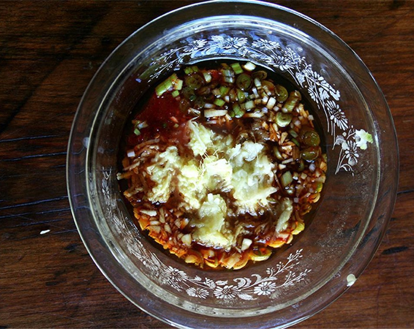 step 5 Whisk together Mirin (4 Tbsp), grated Apple, Soy Sauce (2 Tbsp), Light Corn Syrup (1 Tbsp), Scallions (1 1/2 Tbsp), Gochujang (1 Tbsp), Fresh Ginger (1 Tbsp), Garlic (2 cloves), Sesame Oil (1 tsp), and Rice Vinegar (1 tsp).