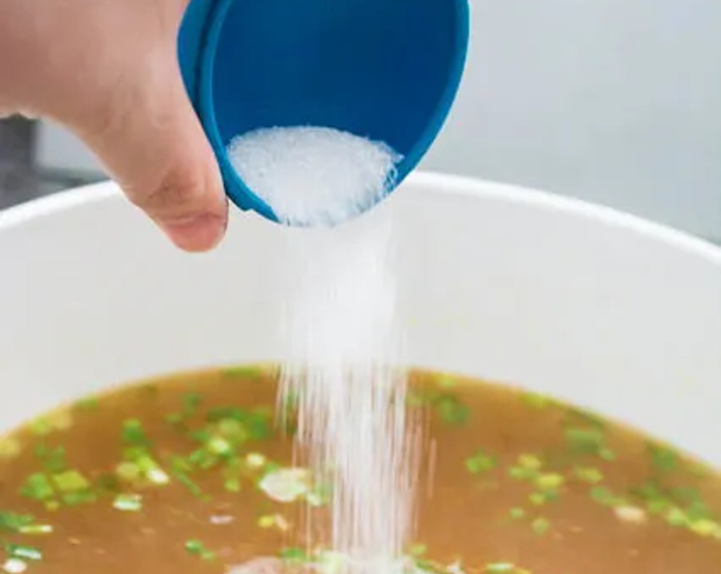 step 7 Add Light Soy Sauce (1 Tbsp), Shaoxing Cooking Wine (1 Tbsp), Sesame Oil (2 tsp), Ground White Pepper (1 dash), Scallion (1/2 cup), and Sugar (2 tsp).