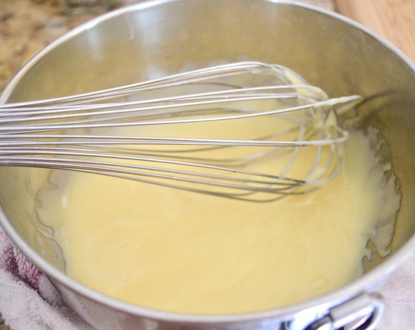 step 3 While it cools, make the lemon mayo. Wrap a bowl with a cold, damp towel. Whisk the Lemon Juice, Dijon Mustard (1 Tbsp) and Egg (1) yolk together in that bowl until it is bubbly and thoroughly mixed. Then keep whisking while you slowly pour in the Olive Oil (1 cup) until you have a gorgeous, thick mayo.