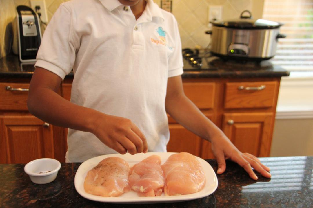 Step 2 of Slow Cooker Southwest Chicken Recipe: Season the Chicken Breast (1 pound) with Salt (1/8 teaspoon), Ground Black Pepper (1/8 teaspoon), Garlic Powder (1 teaspoon) and Onion Powder (1 teaspoon) on both sides.