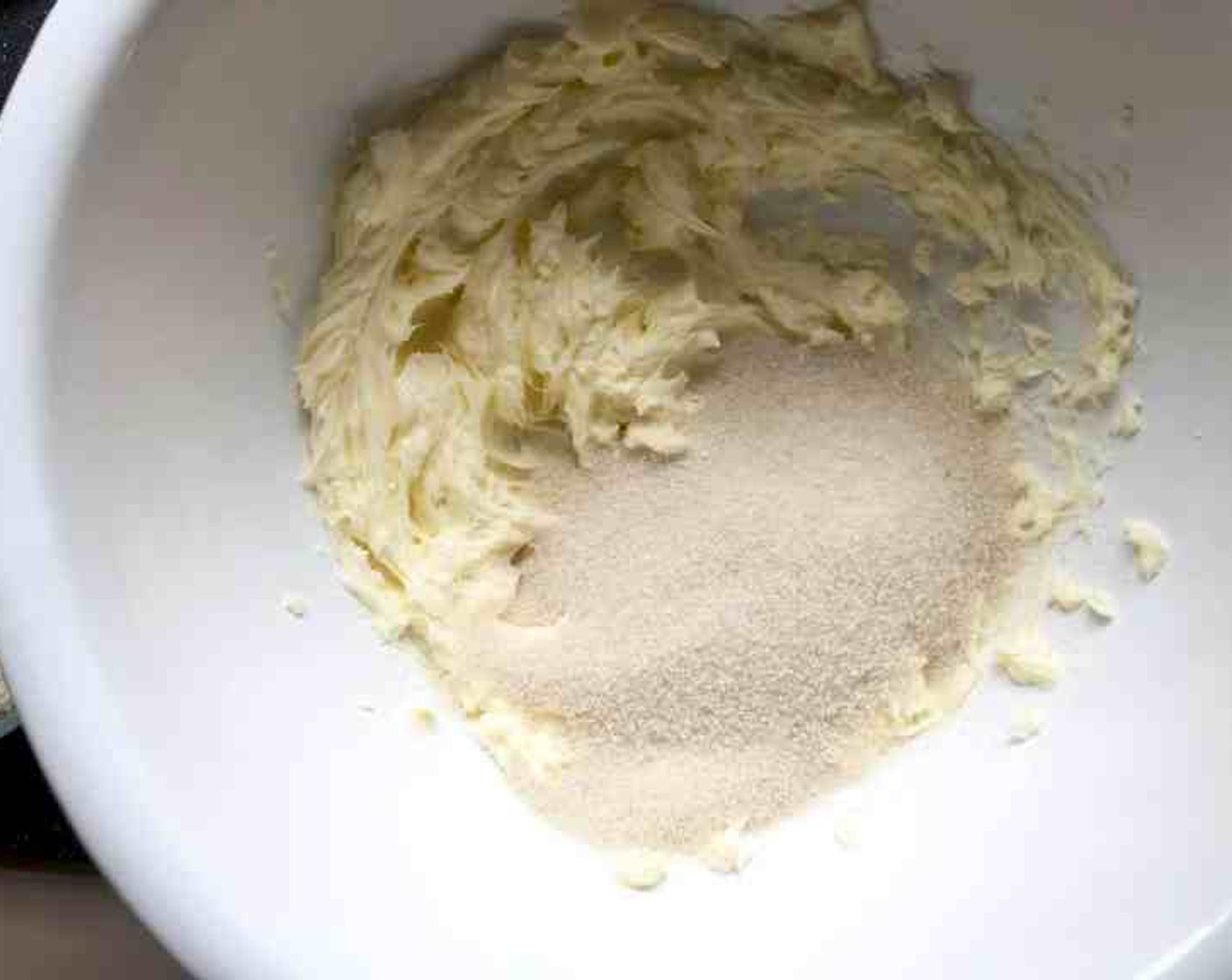 step 2 In the bowl of an electric mixer fitted with the paddle attachment, beat the Butter (3/4 cup) until creamy. Gradually add the Granulated Sugar (1 1/4 cups) and continue beating until light and fluffy.
