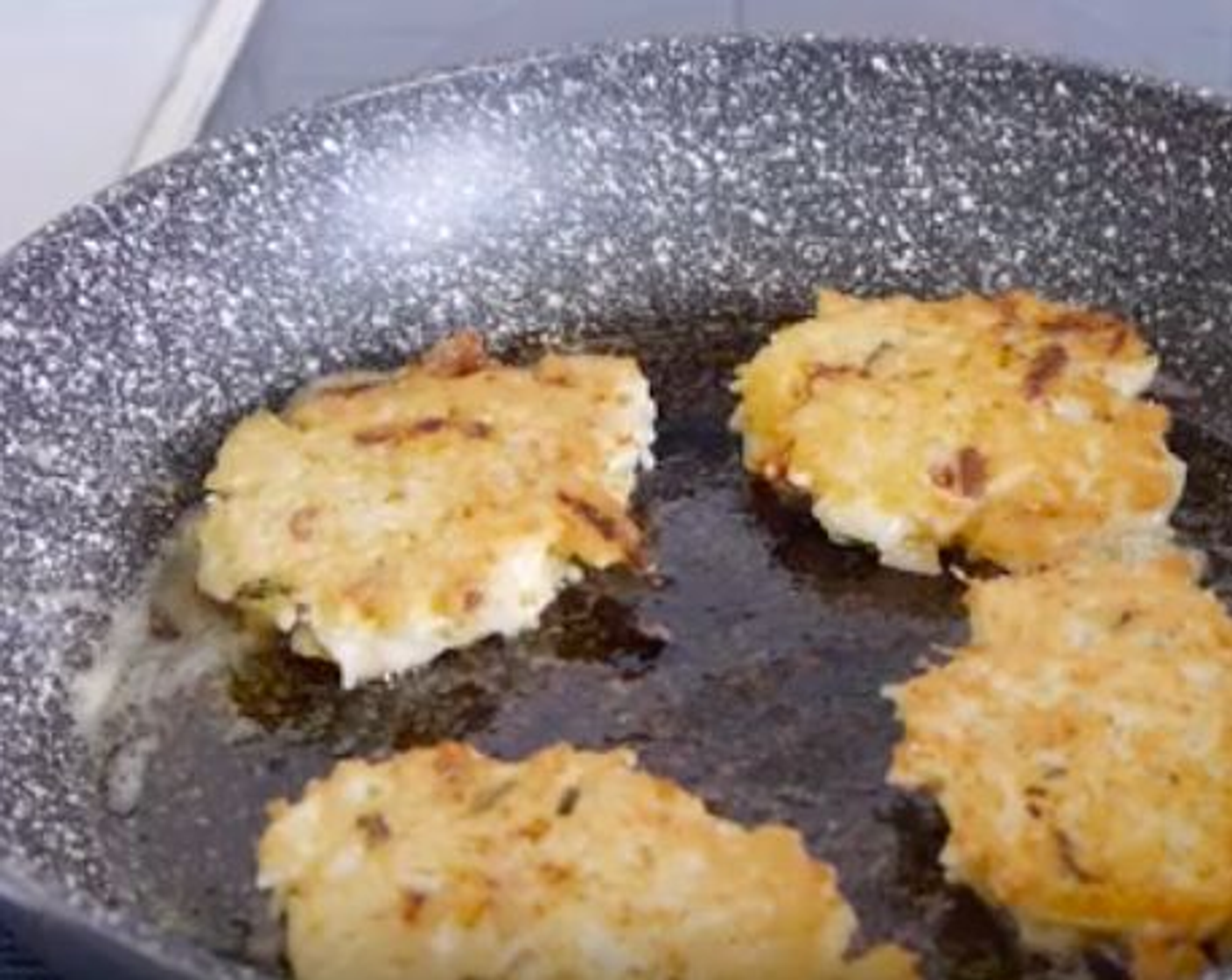 step 4 Cook the rice cakes for 4 minutes on each side.