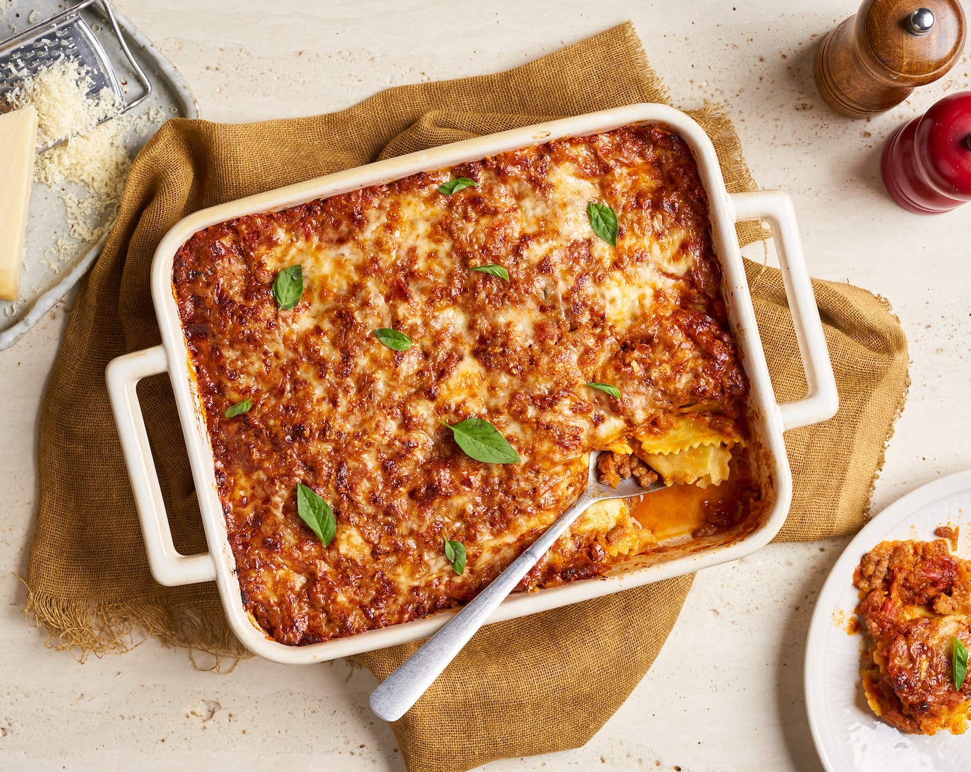step 12 Allow the lasagna to cool a minimum of 15 minutes before serving, sprinkle with Fresh Basil (1 Tbsp). Serve.