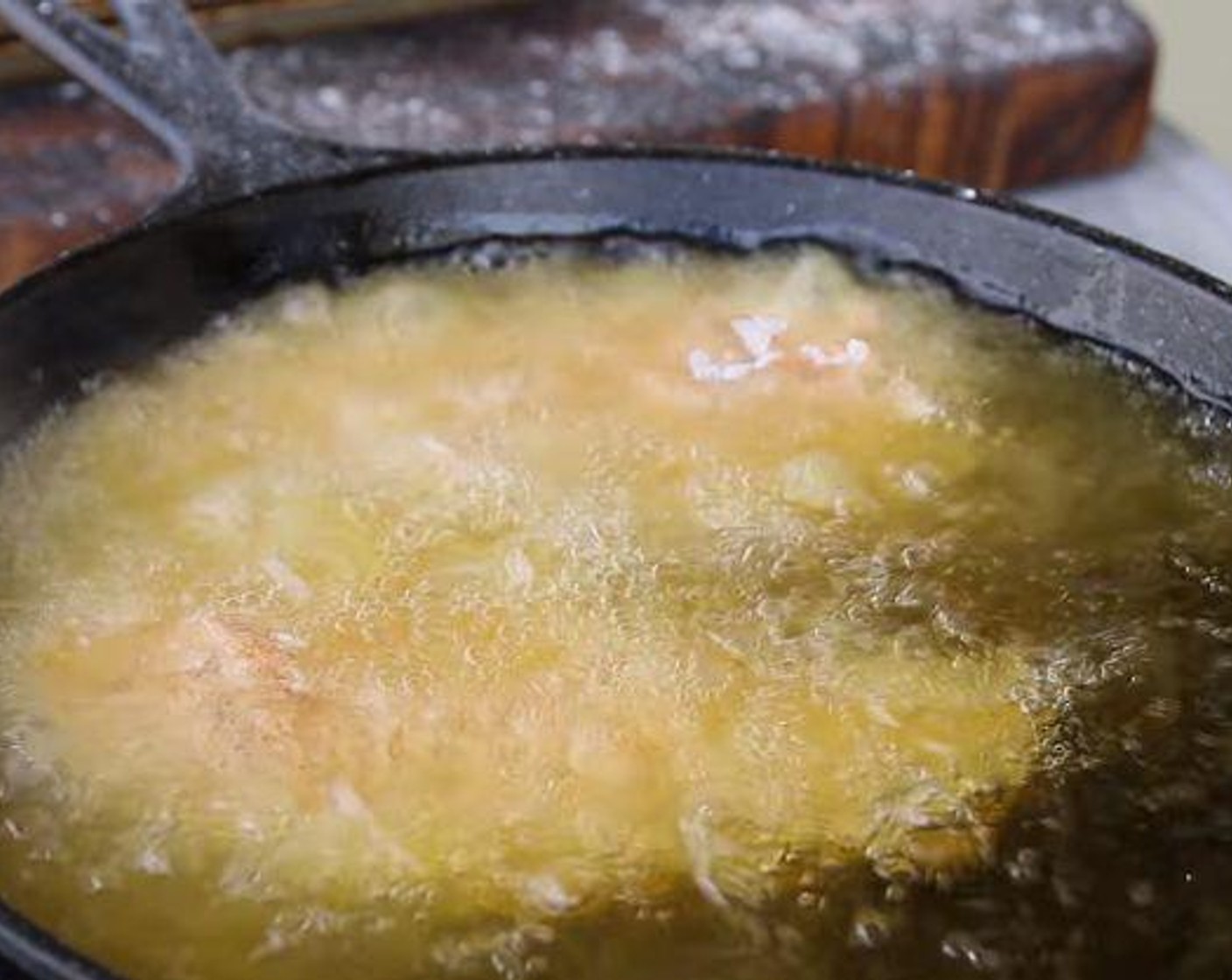 step 4 Place few chicken tenders in the hot oil without crowding the pan. Cook until golden brown on the bottom side, a few minutes, then flip and cook until second side is also golden, a few minutes more. Set cooked tenders on plate lined with paper towels.