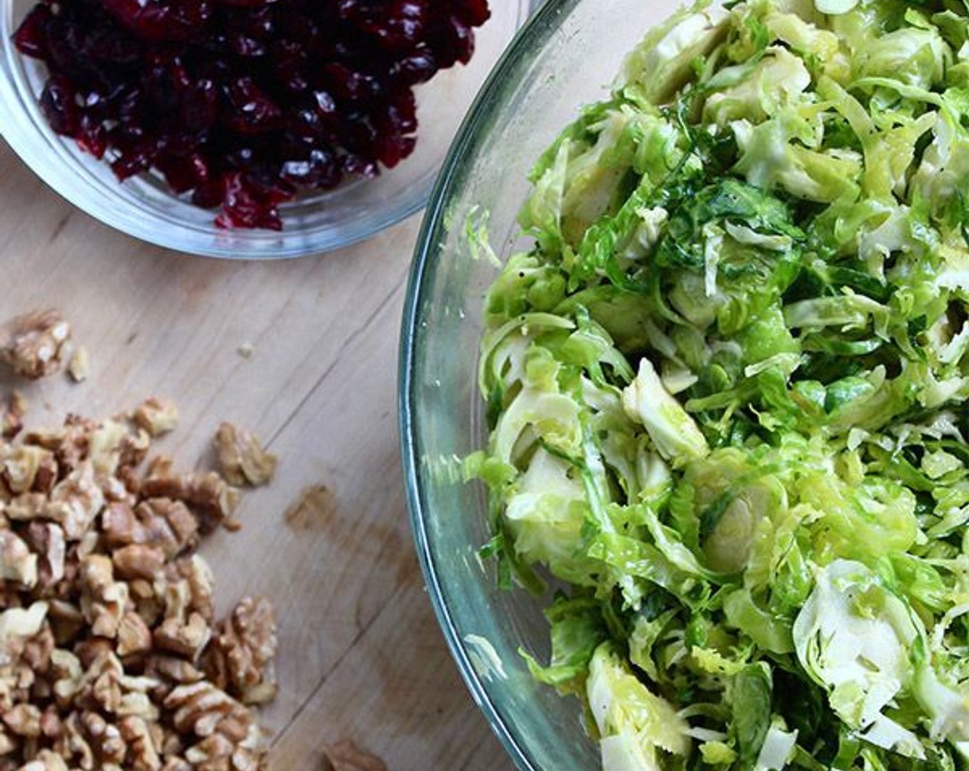 step 5 Place the Brussels sprouts in a large bowl and pour the dressing over them. Add the Dried Cranberries (3/4 cup) and toss well to combine. Set aside for at least fifteen minutes or up to an hour.