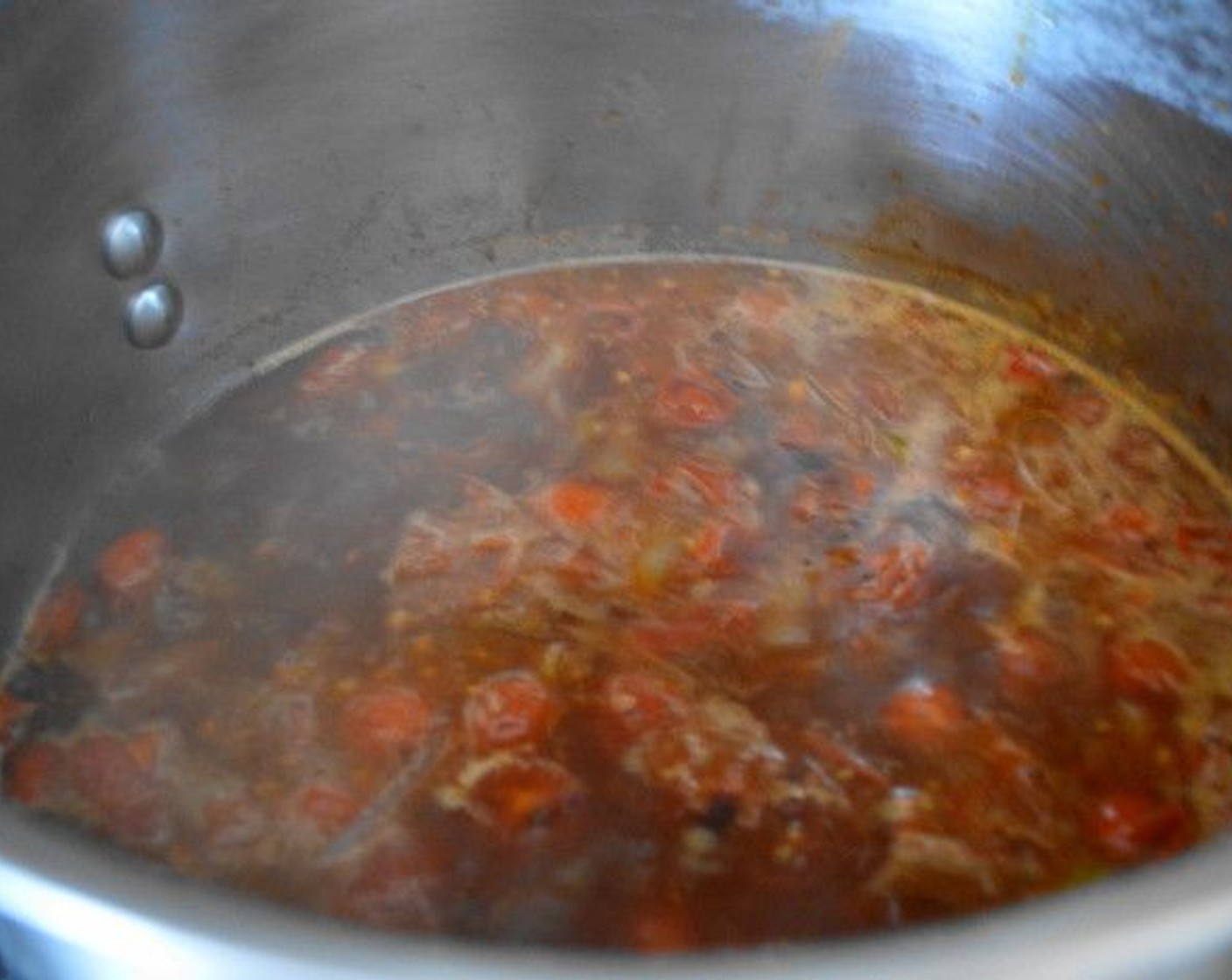 step 9 Deglaze the pot with Red Wine (1 cup). Let the wine cook off for 3-4 minutes, then add the Worcestershire Sauce (1 dash), Beef Stock (4 cups), and Bay Leaves (2).