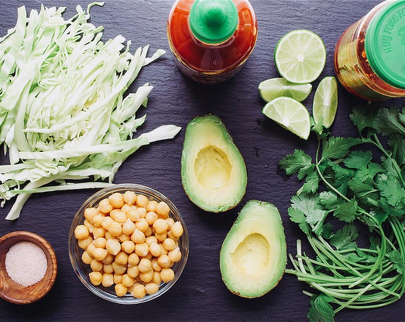 step 1 Slice the Avocado (1), shred the Green Cabbage (1/4 head). Slice the Lime (1) into wedges.