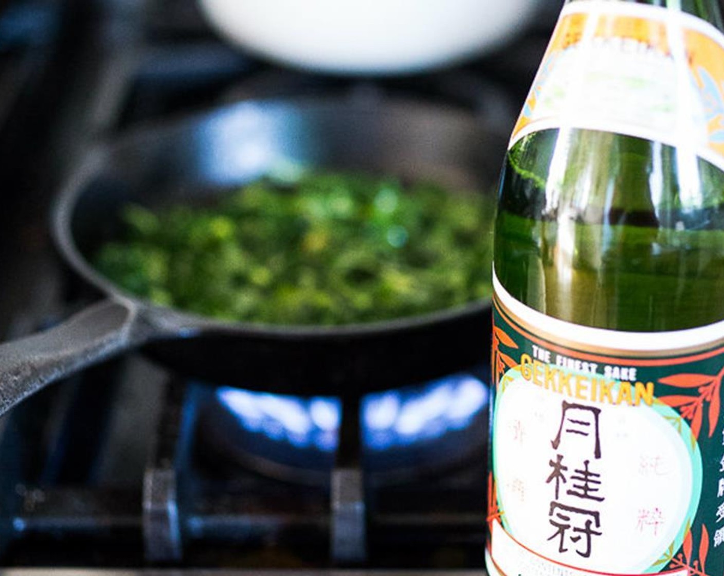 step 11 Stir and let it wilt, 3-5 minutes. Splash with a little Sake (to taste), let it burn off, and season with Salt (to taste) and Ground Black Pepper (to taste).