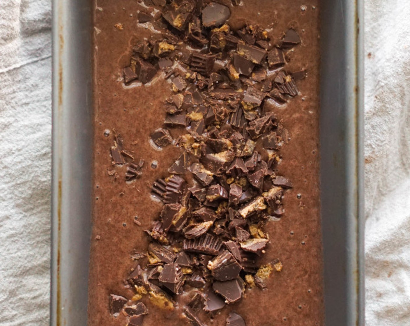 step 13 Add in the chocolate cup pieces and give a quick stir. Pour into a loaf pan and freeze 1-2 hours until solid.