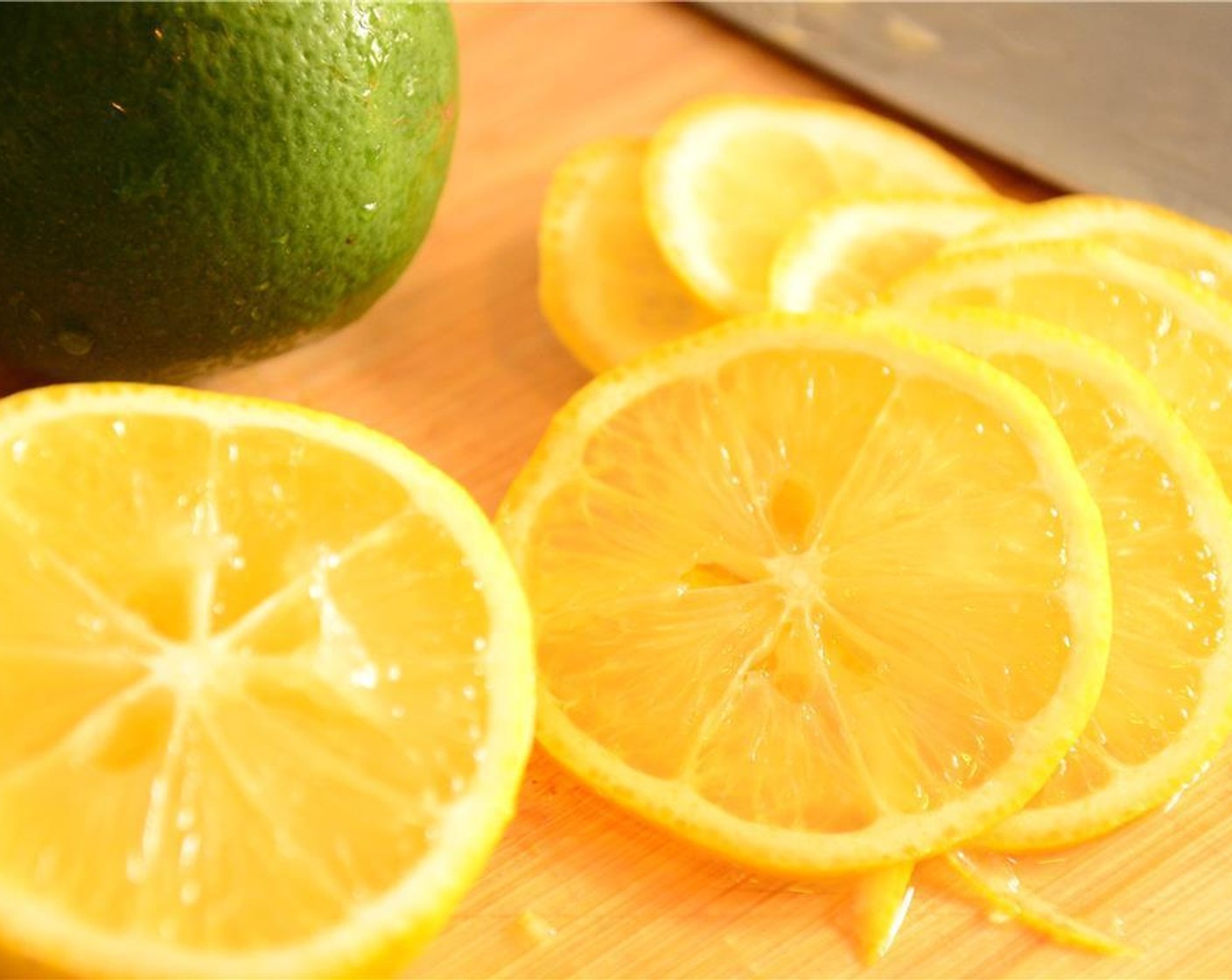 step 3 Slice the lemon and lime into thin wheels and remove the seeds.