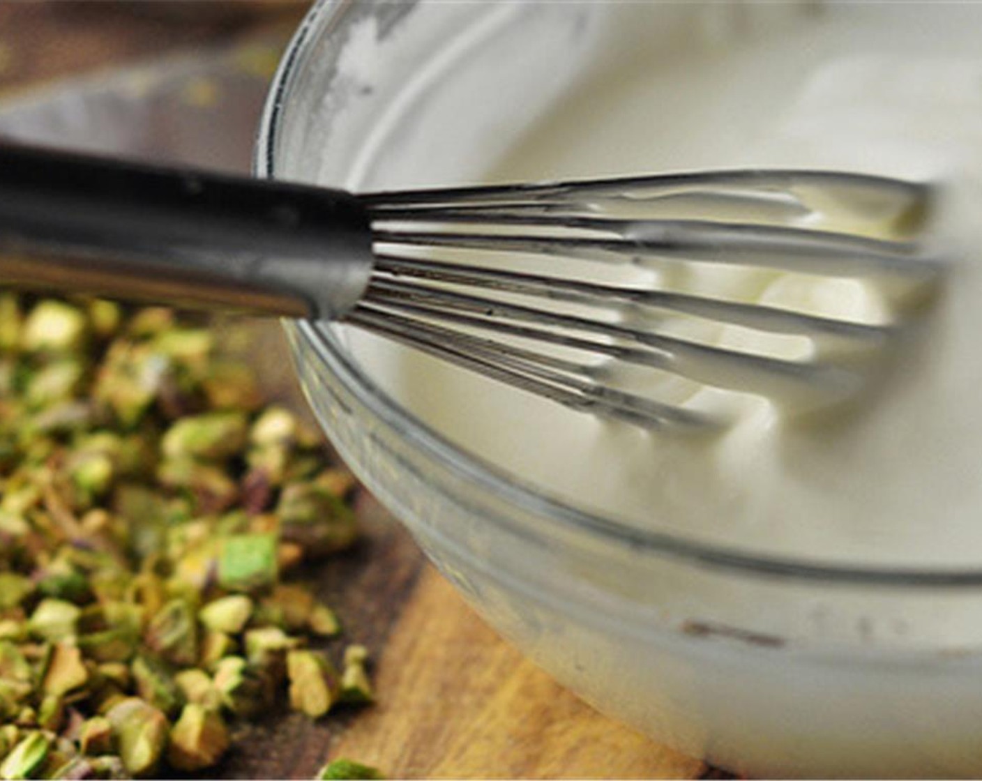 step 9 For the glaze, combine the Powdered Confectioners Sugar (1 1/4 cups), Heavy Cream (3/4 cup), and juice from Lemon (1) in a bowl. Whisk until completely smooth.