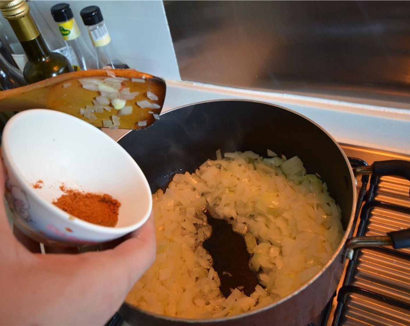 step 5 Add Ground Cumin (1 tsp), Chili Powder (1/2 Tbsp) and chili pepper stir for 2 more minutes.