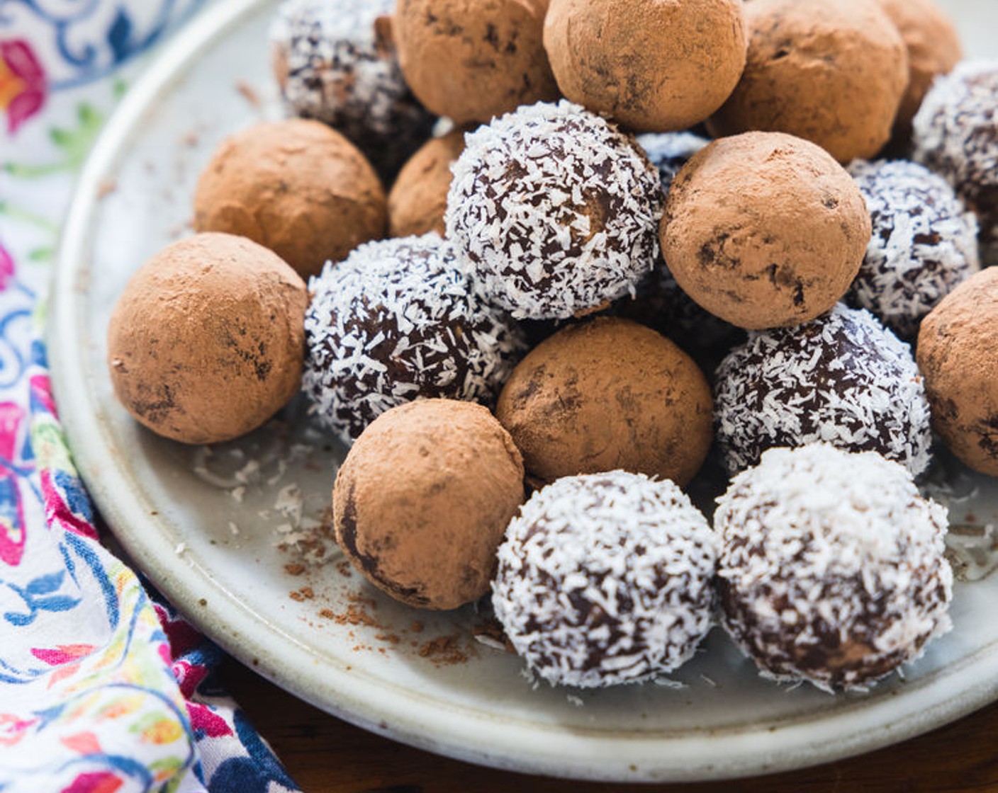 step 3 Form the dough into 1.5-inch balls and roll in Unsweetened Shredded Coconut (as needed) or raw cacao powder.