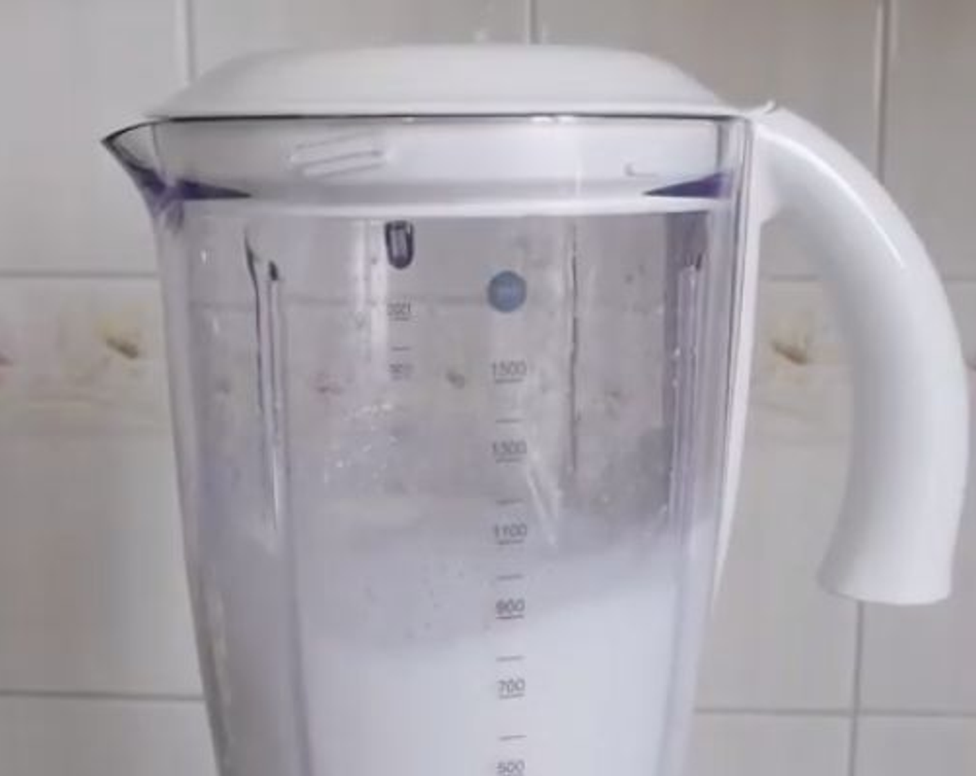 step 1 In a blender or food processor add the Coconut Milk (1 2/3 cups), Granulated Sugar (4 Tbsp), and Milk (1 splash) and blend.