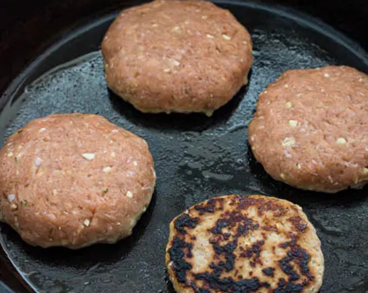 step 4 Flip them over and sear for another 2-3 minutes. Remove the burger patties from the skillet and set them aside.