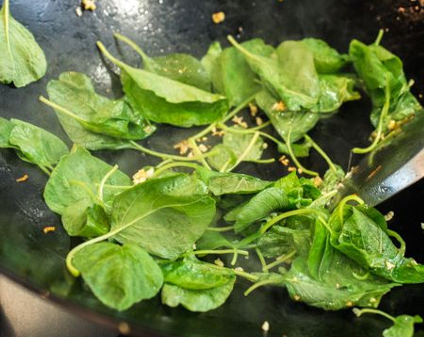 step 8 Stir-fry Garlic (1 clove) and Spinach Leaves (3 cups) until spinach is wilted. Turn off the heat.