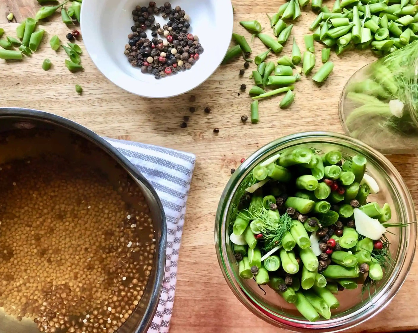 step 4 While still hot, pour the pickling mixture over the green beans so that they are fully submerged in the liquid.