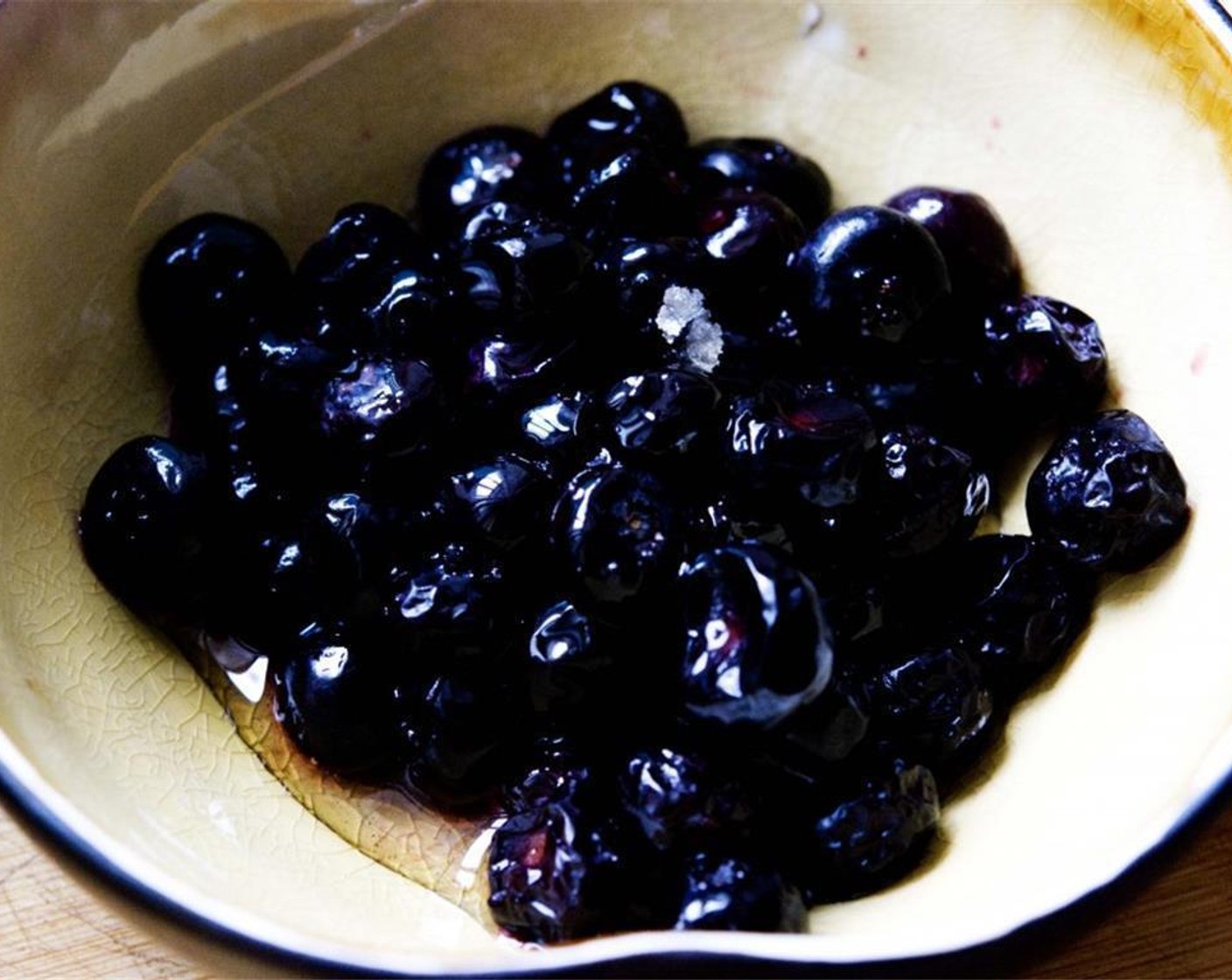 step 1 Take your Frozen Blueberries (1/2 cup) and let them defrost completely. Then, add half of the Honey (1 Tbsp).