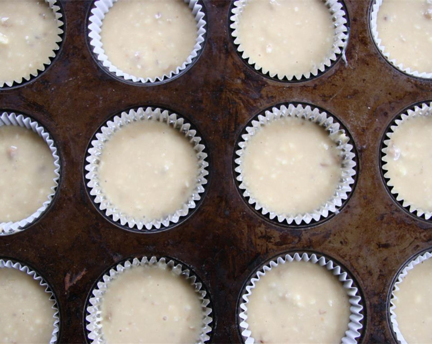 step 7 Fill muffins cups 3/4 full. Bake for 20 minutes, then let cool on a wire rack.