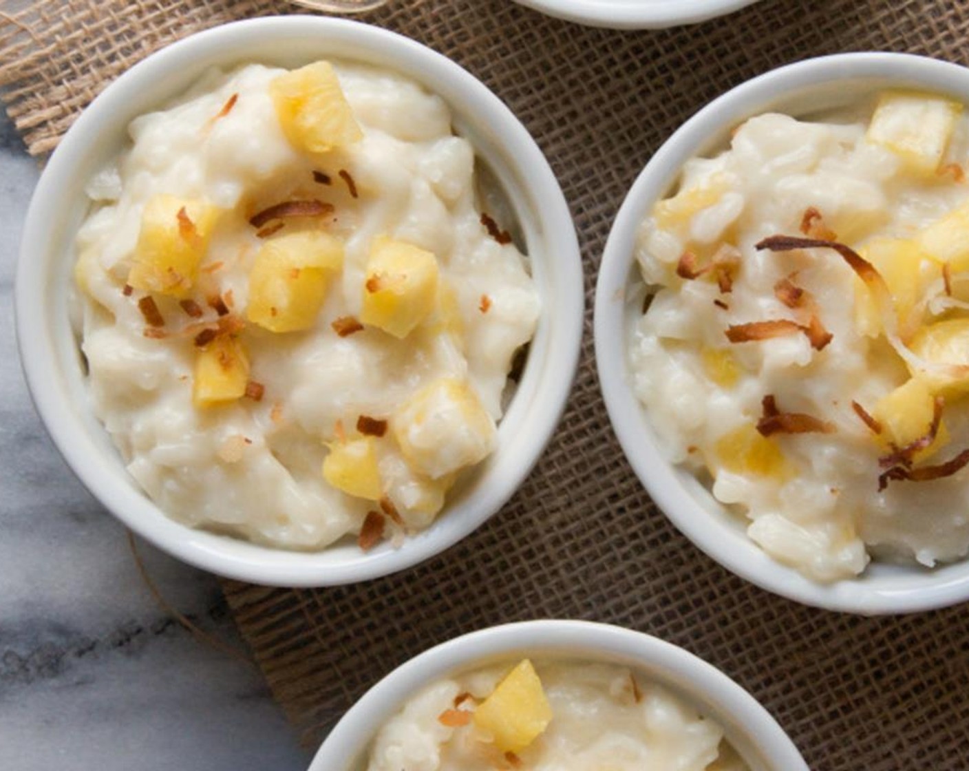 step 5 When ready to serve, preheat the oven to 325 degrees F (160 degrees C) and lay remaining Sweetened Coconut Flakes (1/4 cup) in a single layer on a baking sheet. Cook for 8 to 10 minutes until lightly browned.