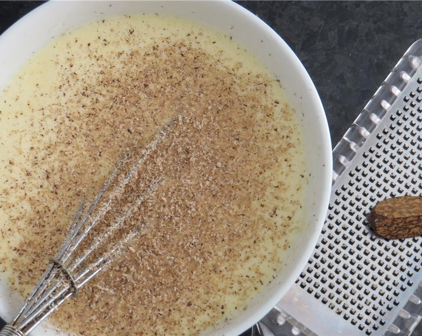 step 7 In a medium bowl, add the Eggland's Best Classic Eggs (4), Milk (1/2 cup), Heavy Cream (1/2 cup), Ground Nutmeg (1/2 tsp), Kosher Salt (1/2 tsp), and Freshly Ground Black Pepper (1/2 tsp). Whisk to combine.