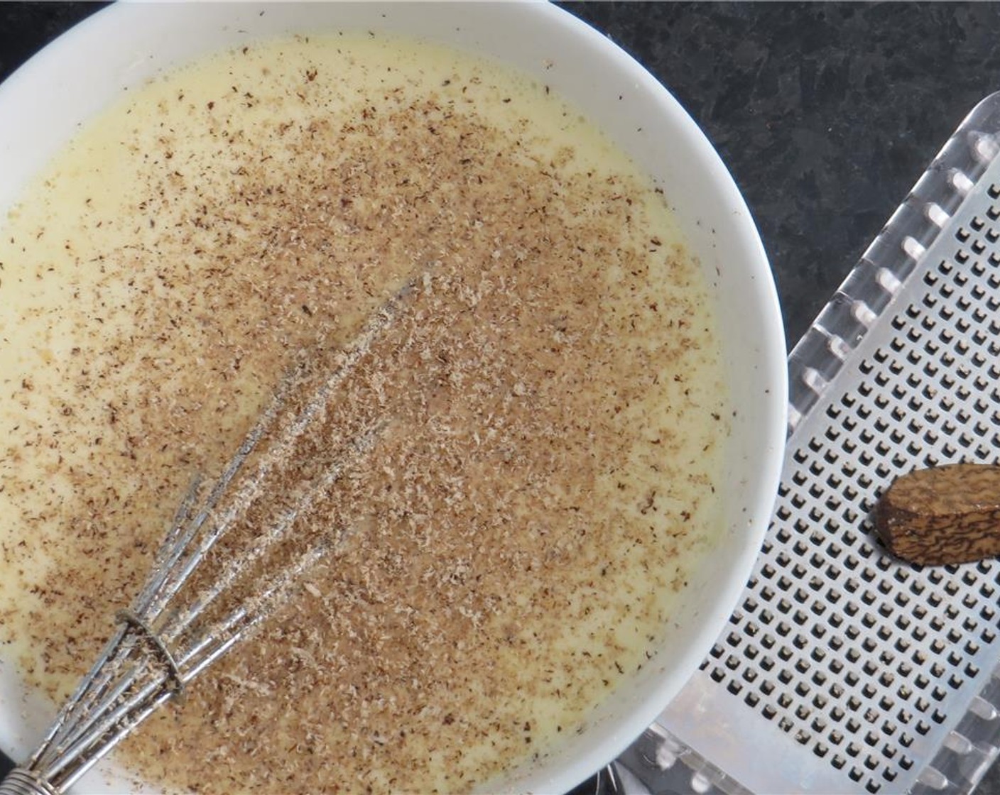 step 7 In a medium bowl, add the Eggs (4), Milk (1/2 cup), Heavy Cream (1/2 cup), Ground Nutmeg (1/2 tsp), Kosher Salt (1/2 tsp), and Freshly Ground Black Pepper (1/2 tsp). Whisk to combine.