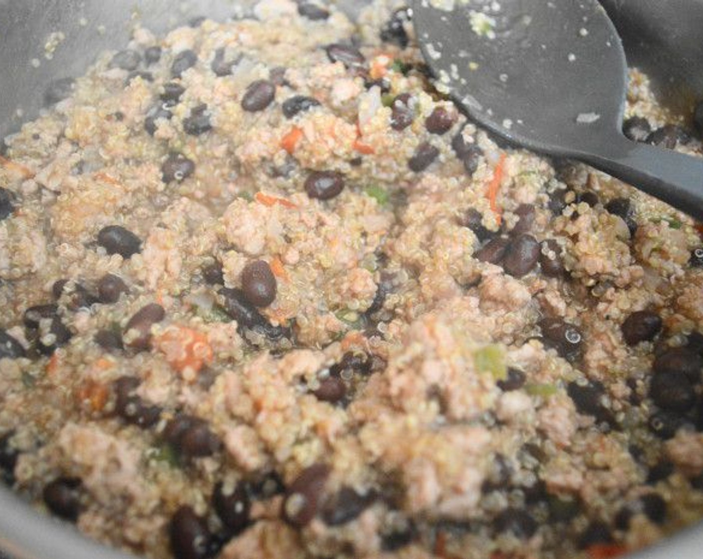 step 7 Then add in the Canned Black Beans (1 can) and zest and juice of the Lime (1). Let the mixture come to a low boil, then reduce the heat to a simmer and let it all simmer for 10 minutes.