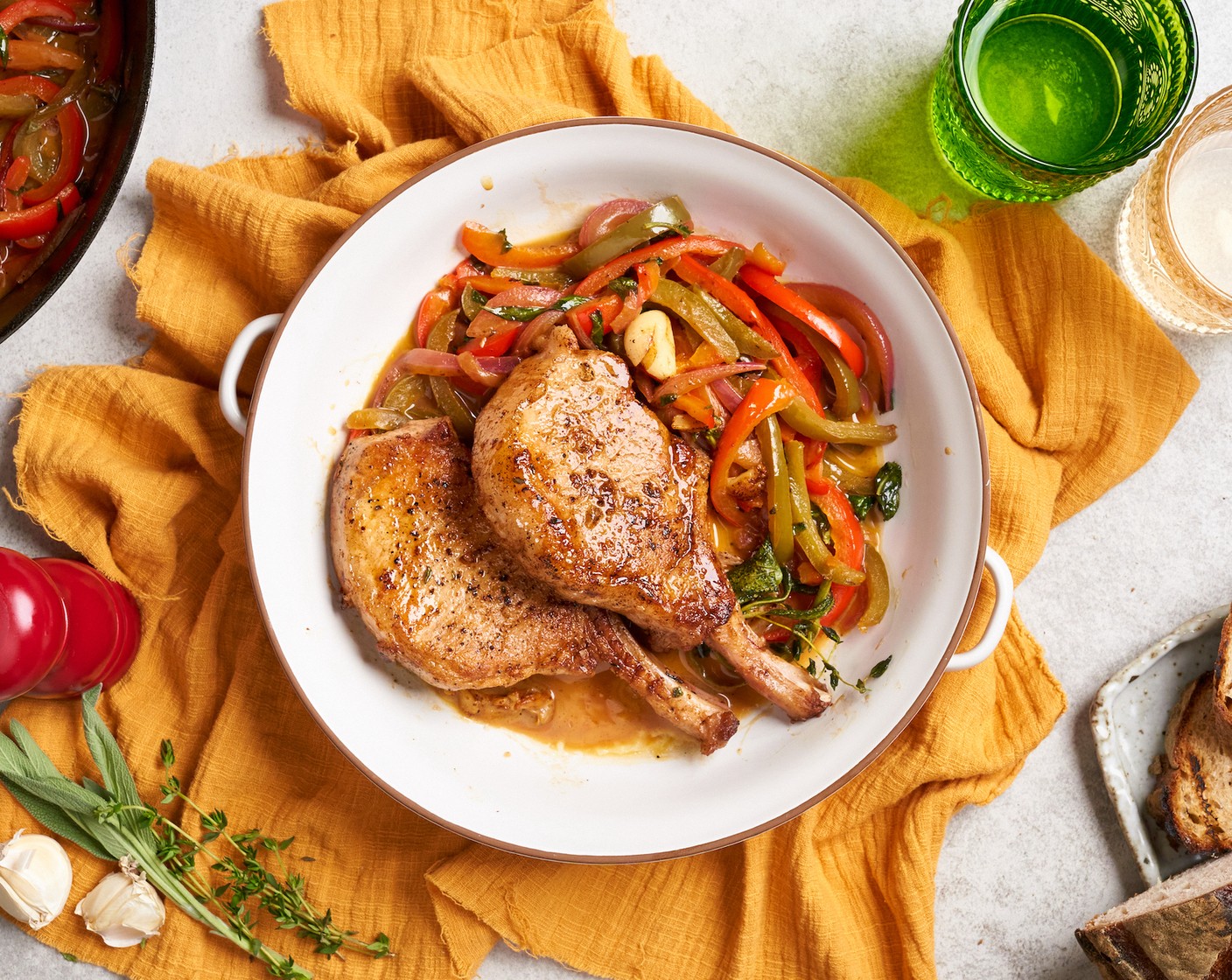 step 7 Spoon the sweet and sour sauce onto a serving platter and place the rested pork chops on top. Serve with your choice of starch to complete the meal.