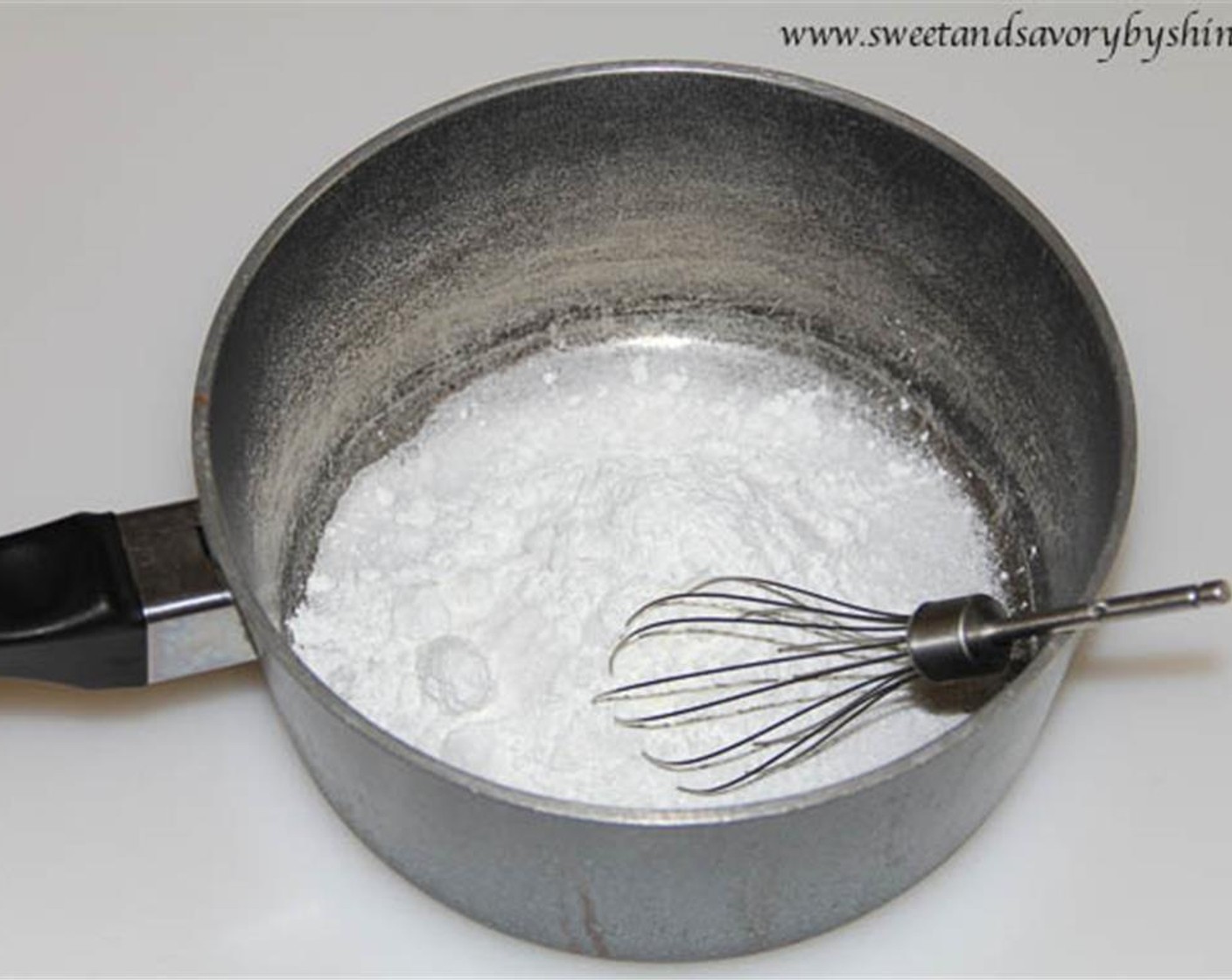 step 11 In a medium saucepan, combine white Granulated Sugar (150 g) and sifted Corn Starch (3 Tbsp). Stir in the Pomegranate Juice (480 mL).