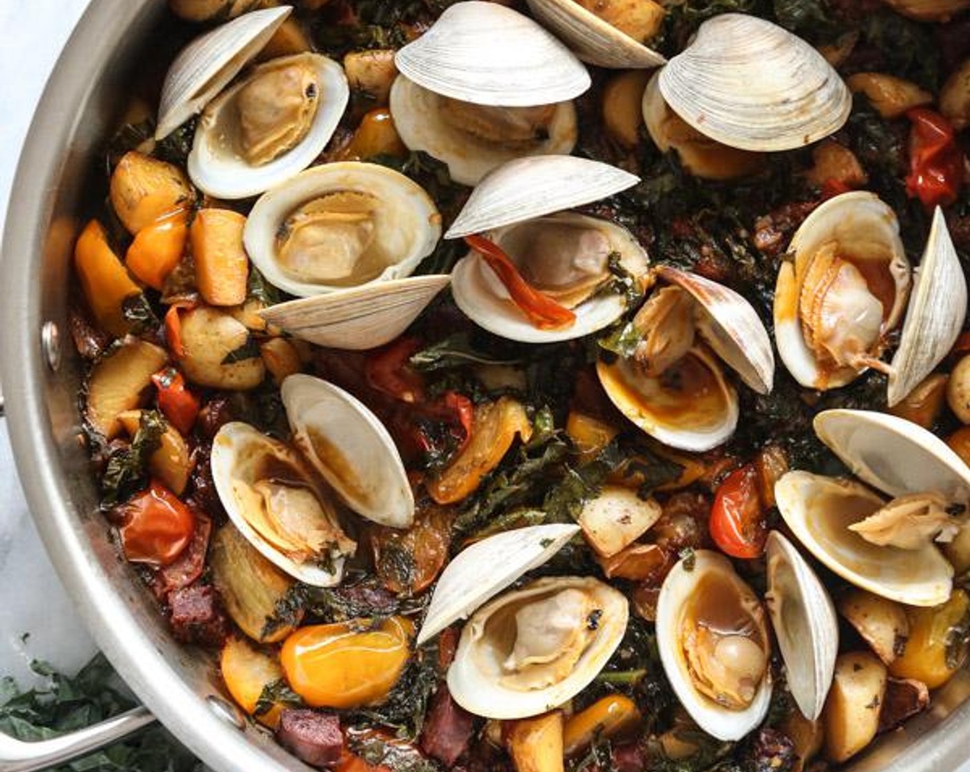 Steamed Clams with Chorizo, Tomatoes and Kale