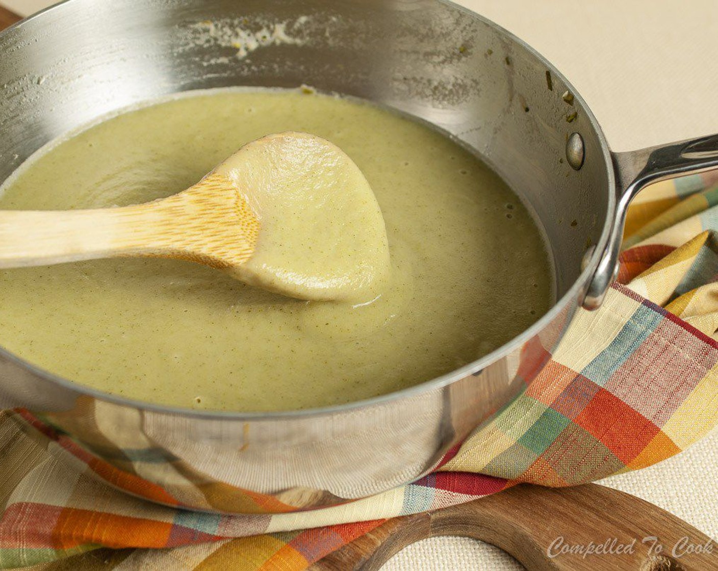 step 7 Return to pot, add 1% Low Fat Milk (1 cup) and broccoli flowerettes. Bring to a gentle simmer and cook covered until flowerettes are tender, about 10-12 minutes, stirring occasionally.