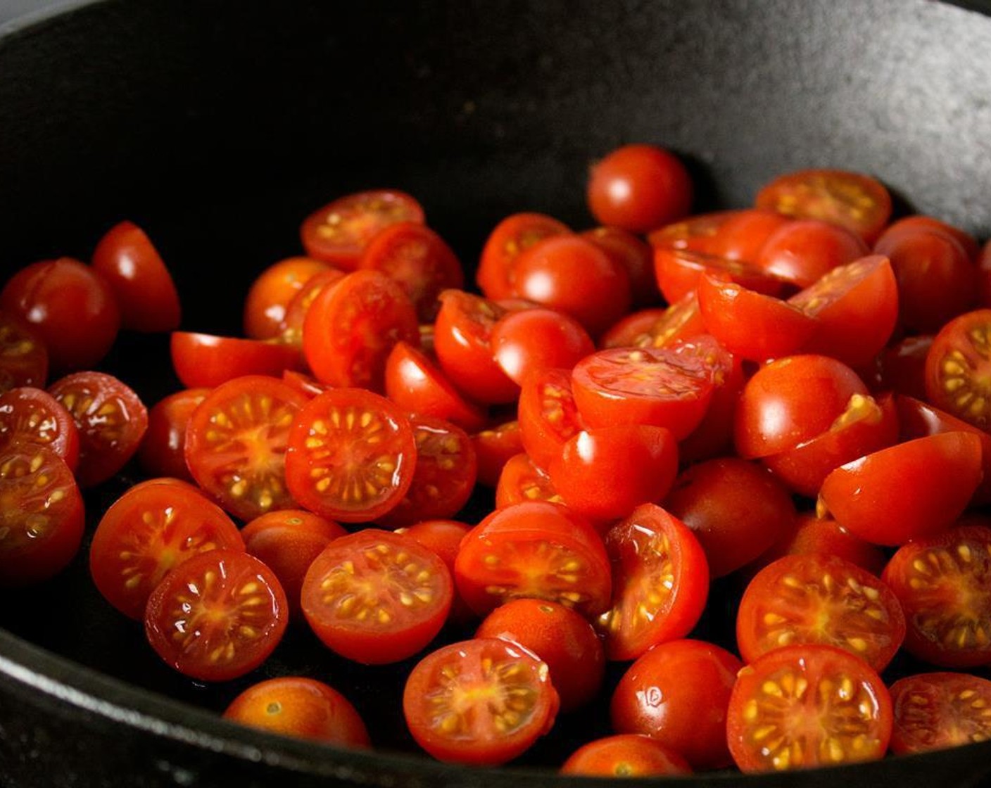 step 1 Combine Cherry Tomatoes (2 cups), juice of the Lemon (1/2), Distilled White Vinegar (1/2 Tbsp), Brown Sugar (1/2 cup), Crushed Red Pepper Flakes (1/4 tsp), Freshly Ground Black Pepper (1 pinch), and Salt (1 pinch) in a cast iron pan.