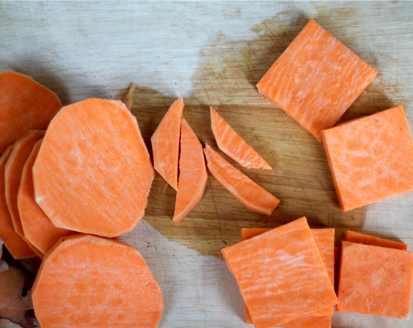 step 4 While the rice cooks, prepare the sweet potato filling by peeling the Sweet Potato (1/2) and cutting it into 1/4 inch slabs. Square the slabs down to size, depending on what you will use for your onigiri mold.