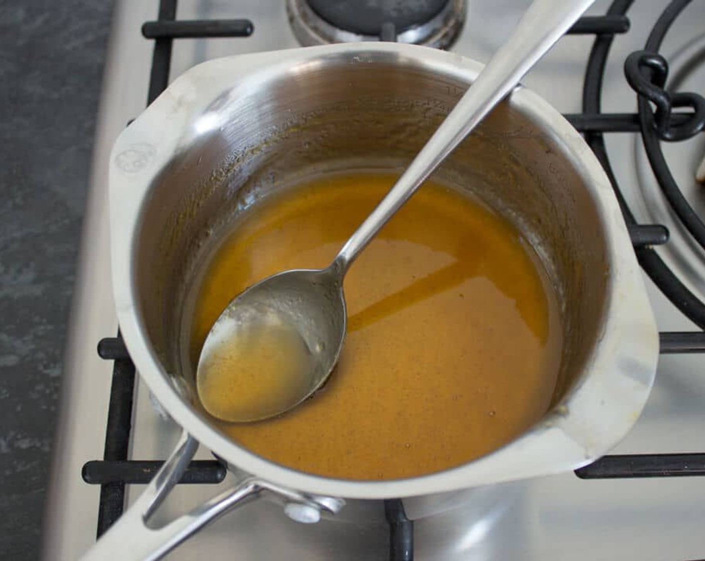 step 28 While the pastries are baking, Warm the Apricot Jam (1/2 cup) in a saucepan with a little Water (1 Tbsp) to make a thin, runny glaze.