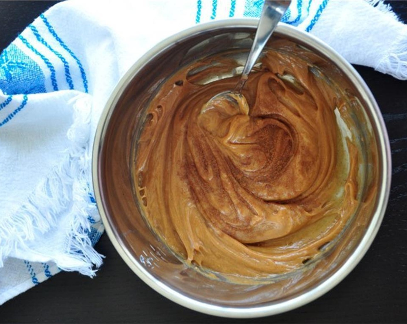 step 1 In a mixing bowl, stir together Corn Syrup (1/2 cup), Peanut Butter (1/2 cup), and Ground Cinnamon (1/2 tsp).