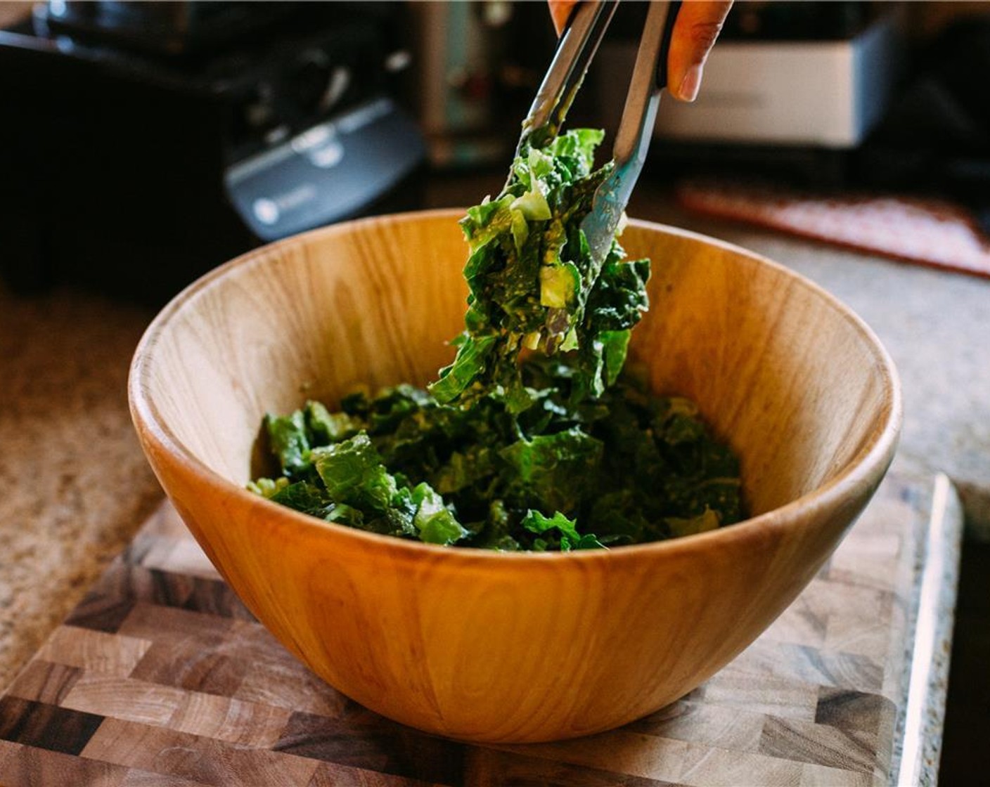 step 8 Add the dressing to the lettuce and toss to coat.