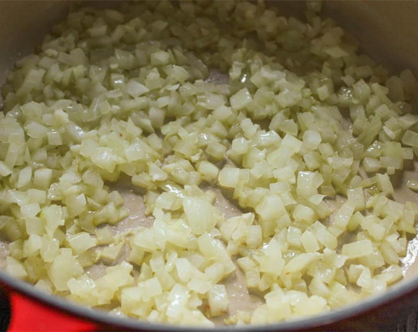 step 4 In a Dutch oven or large saucepan, heat 1 tablespoon of Olive Oil (1 Tbsp). When hot, add the onions and garlic and sauté for 3 minutes until the onions become translucent and the garlic is fragrant.