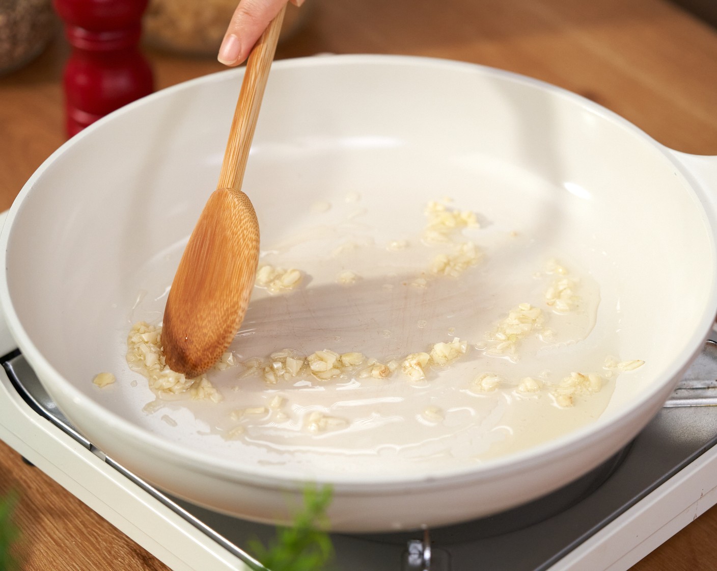 step 1 In the skillet, heat the Vegetable Oil (1 Tbsp) over medium heat. Once hot, add the Garlic (3 cloves) and cook for 1-2 minutes.