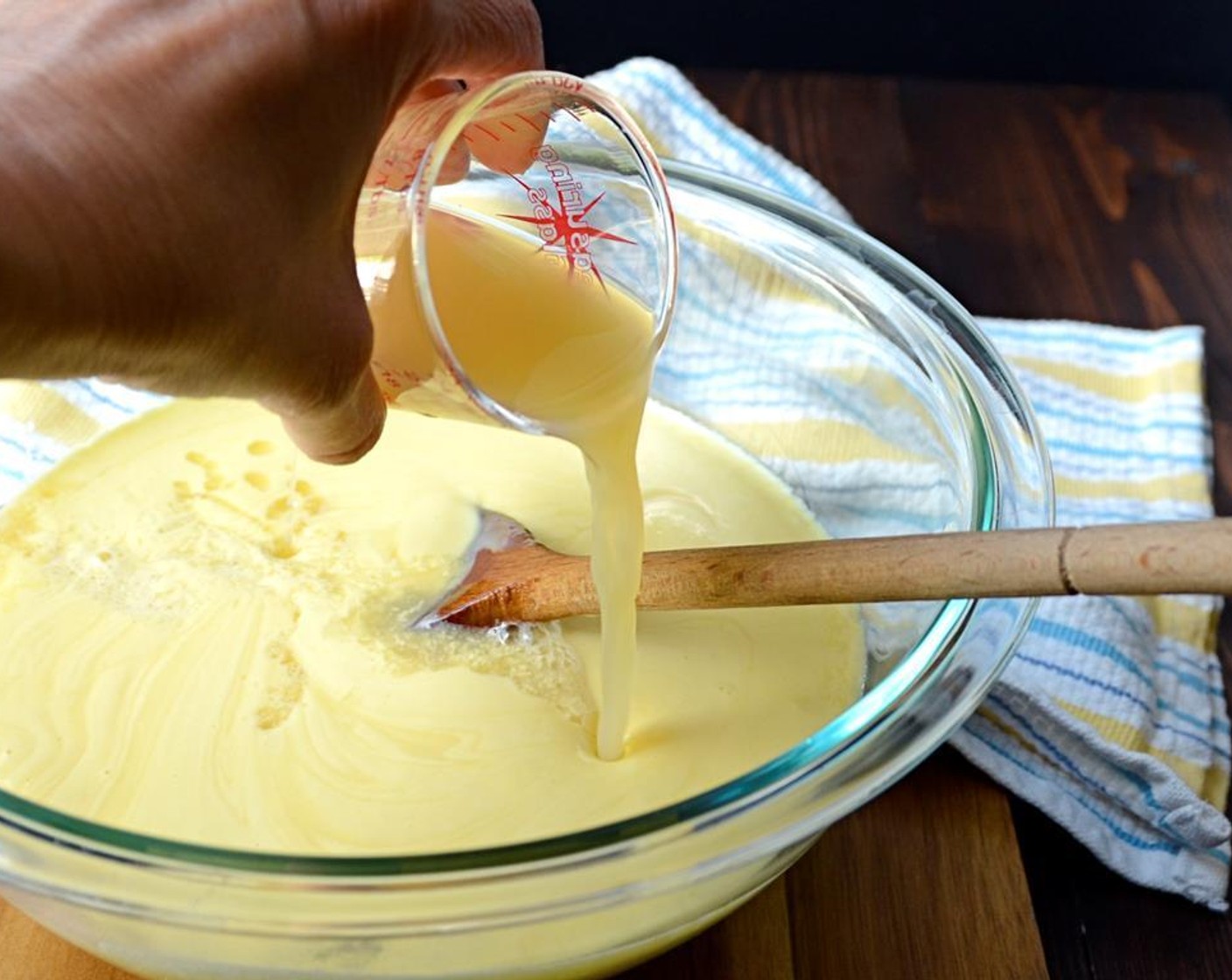 step 9 Then stir in the Sweetened Condensed Milk (1 can) and Key Lime Juice (1/2 cup). Cover and refrigerate until cold or overnight.