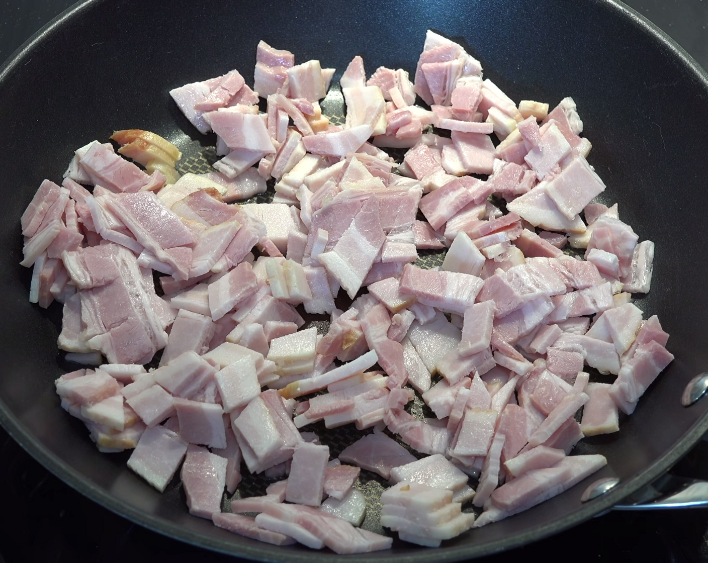 step 2 In a frying pan, lightly fry Streaky Bacon (6 slices), stirring occasionally for a few minutes until it's cooked to your liking.