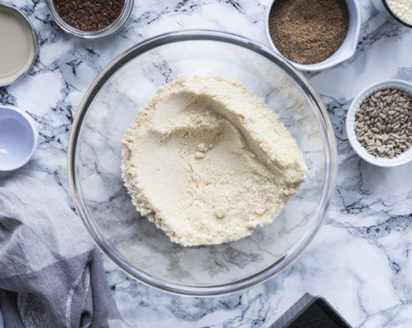 step 3 Mix together Almond Flour (2 1/2 cups), Tapioca Starch (1/2 cup), Ground Flaxseed (1/3 cup), Pink Himalayan Sea Salt (1 tsp), and Baking Powder (1 tsp) in a large bowl.